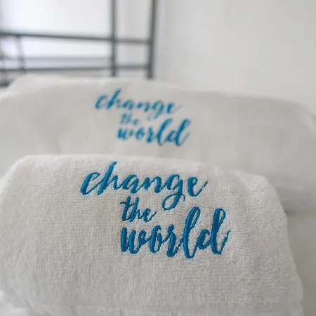 Change The World - Cascais - بيت شباب
